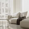 Modern Sectional Sofa In Living Room With Plush Pillows Coffee Table And Sunlight
