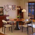 Cozy Wooden Round Dining Table With Four Beige Chairs Green Flower Vase And Fruit Plate