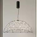 Modern Spherical Chandelier With Metal Frame And Small Lights In Indoor Setting