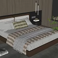 Modern Bedroom Interior With Cozy Bed Pillows Striped Blanket Nightstand Lamp And Green Plant