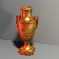 Gold Award Trophy With Decorative Handles And Intricate Base Design