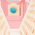 Colorful Playground with Pink Yellow Railings Circular Blue Ball Pit and Grid Design