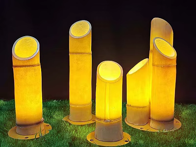 Bamboo Shaped Outdoor Lights Standing on Green Grass with Warm Yellow Glow in Night Scene 3d model