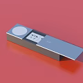 Silver Metal Rectangular Daily Life Product With Round Button And Digital Display On Red Background 3d model