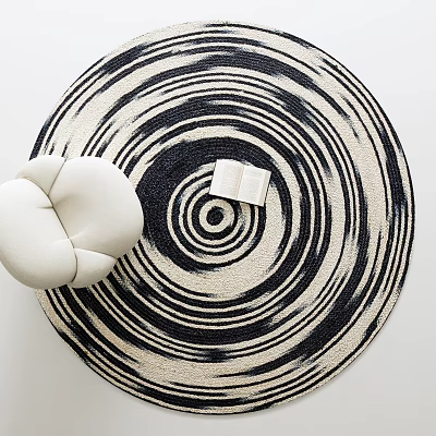Stylish Round Carpet With Black And White Spiral Pattern White Cushion And Open Book 3d model