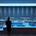 Modern Seafood Display Counter With Glass Tanks And Fresh Seafood In Restaurant
