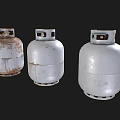 Three Industrial Propane Tanks Showing Various Degrees of Wear and Rust