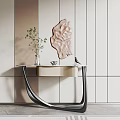 Elegant Modern Console Table With Glass Top Metal Legs Green Plant And Wall Sculpture