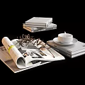 Stylish Open Magazine with Stack of Books and Teacup on Saucer with Decorative Twigs