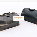 Vintage Black Leather Bags With Worn Surface Cracked Texture Metal Clasps and Handles