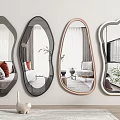 Various Shaped Mirrors Hanging On Living Room Wall With Small Decor Ornament