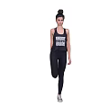Woman In Sleeveless Top With HOPE Print And Black Leggings On Brown Background