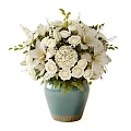 Elegant White Flower Arrangement in Green Vase With Various Flowers And Fresh Green Leaves