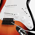 Electric Guitar With Sunburst Finish Wooden Neck And White Pickguard On Dark Background