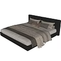 Modern Double Bed Interior With Black Headboard White Bedsheets Brown And Beige Pillows And Blanket
