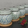 Ceramic Spice Jars With Blue And White Floral Patterns On Wooden Coasters