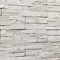 White Stone Wall Featuring Natural Textured Bricks in Modern Interior Design