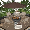 Outdoor Table and Chair Set With Umbrella Leafy Plants and Fruits on Wooden Deck