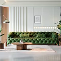 Elegant Living Room Interior With Green Velvet Sofa Wooden Coffee Table Floor Lamp And Plants