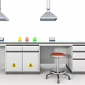Laboratory Setup With Blue Countertop Fume Hoods Reagent Bottles Sink Faucet And Warning Signs