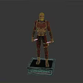 Red Superhero Statue Standing On Square Base With Red Costume And Daggers