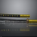 Traditional Katana With Black Yellow Sheath And Brass Hilt On Reflective Surface