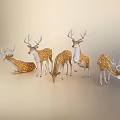 Golden and White Spotted Deer Figurines in Various Poses on Light Background