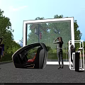 Futuristic Seating Device On Display In Glass Frame With People Observing Near Trees