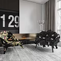 Two Stylish Accent Chairs Floral Pattern And Black Pom Pom Design In Modern Living Space