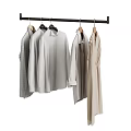 Light Colored Clothes Hanging On Black Rod With Various Styles