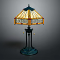 Stained Glass Table Lamp With Geometric Pattern And Metal Base Design