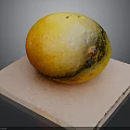 Juicy Ripe Yellow Mango Placed On Pink Mat Against Dark Background