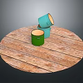 Colorful Buckets Stacked As Daily Living Supplies On Wooden Round Platform