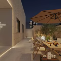 Serene Courtyard Garden Featuring Outdoor Dining Table Chairs Large Umbrella Stone Walls And Evening Lighting