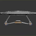 USS Enterprise Spaceship Model With Circular Structure Blue Yellow Lines And Futuristic Design