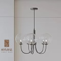 Minimalist Modern Chandelier Design With Three Glass Globes And Black Metal Frame