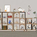 Light Wooden Decorative Cabinets With Books Figurines Globe And Decor Items In Modern Home