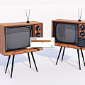Two Vintage Televisions With Wooden Frames Antennas And Black Tripod Stands