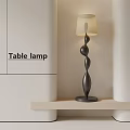Modern Black Floor Lamp With Spiral Design And Cream Shade On Wooden Shelf