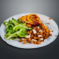 Colorful Fresh Food Plate With Green Lettuce Orange Slices Tofu Cubes And Brown Sauce