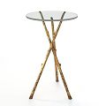 Stylish Dining Table With Glass Top And Crossed Golden Branch Legs