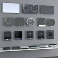 Diverse Electronic Control Devices Wall Mounted With Different Shapes And Shelf
