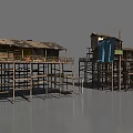 Traditional Ancient Stilted Buildings With Wooden Frames And Thatched Roofs Over Water