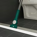 Household Cleaning Mop With Green Handle And White Mop Head On Tile Floor