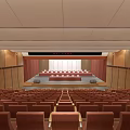 Spacious Conference Room With Red Seats Wooden Walls And Stage Setup