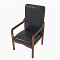 Comfortable Black Leather Armchair With Solid Wood Arms And Modern Design
