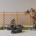 Bamboo Fence In Garden With Rocks And Plants