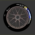 Racing Tire Featuring Black Rubber Copper Colored Alloy Wheel And Stylish Spoke Design