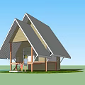 Single Family Detached House With Gabled Gray Roof Wooden Porch And Green Lawn