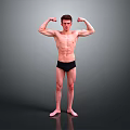 Shirtless Fit Man Flexing Muscles In Black Underwear Standing On Gray Background